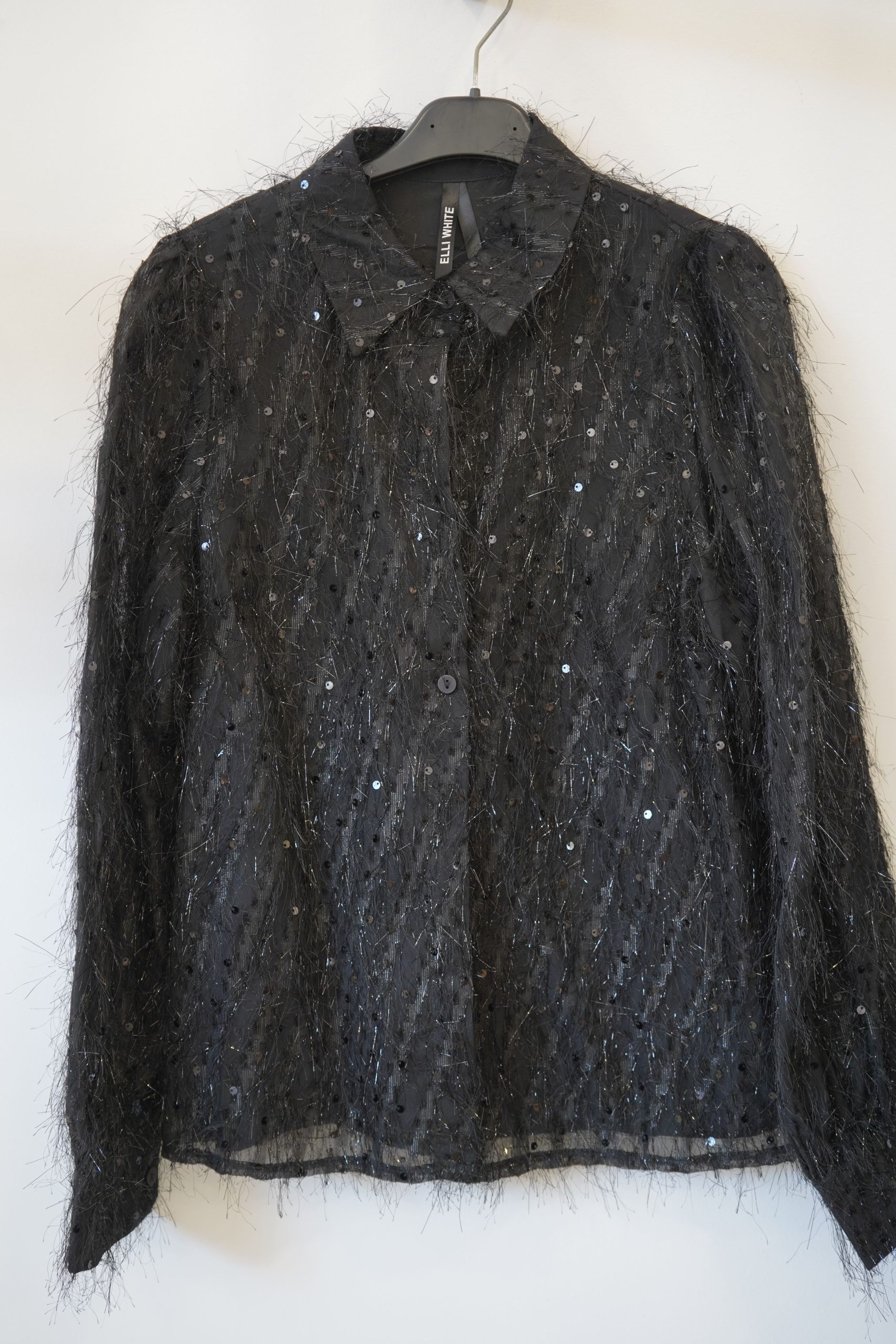 blusa lentejolas