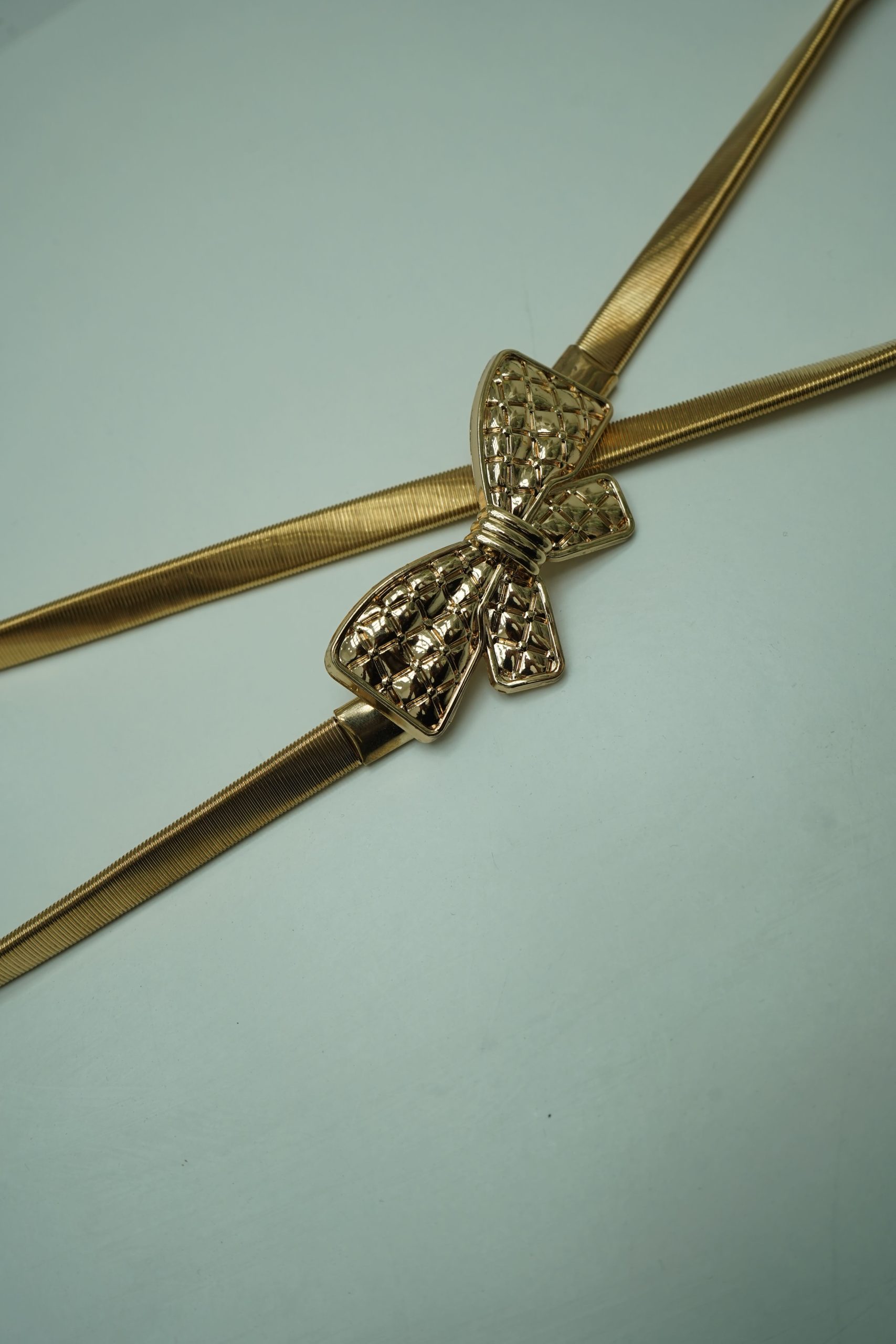 cinto dourado laco