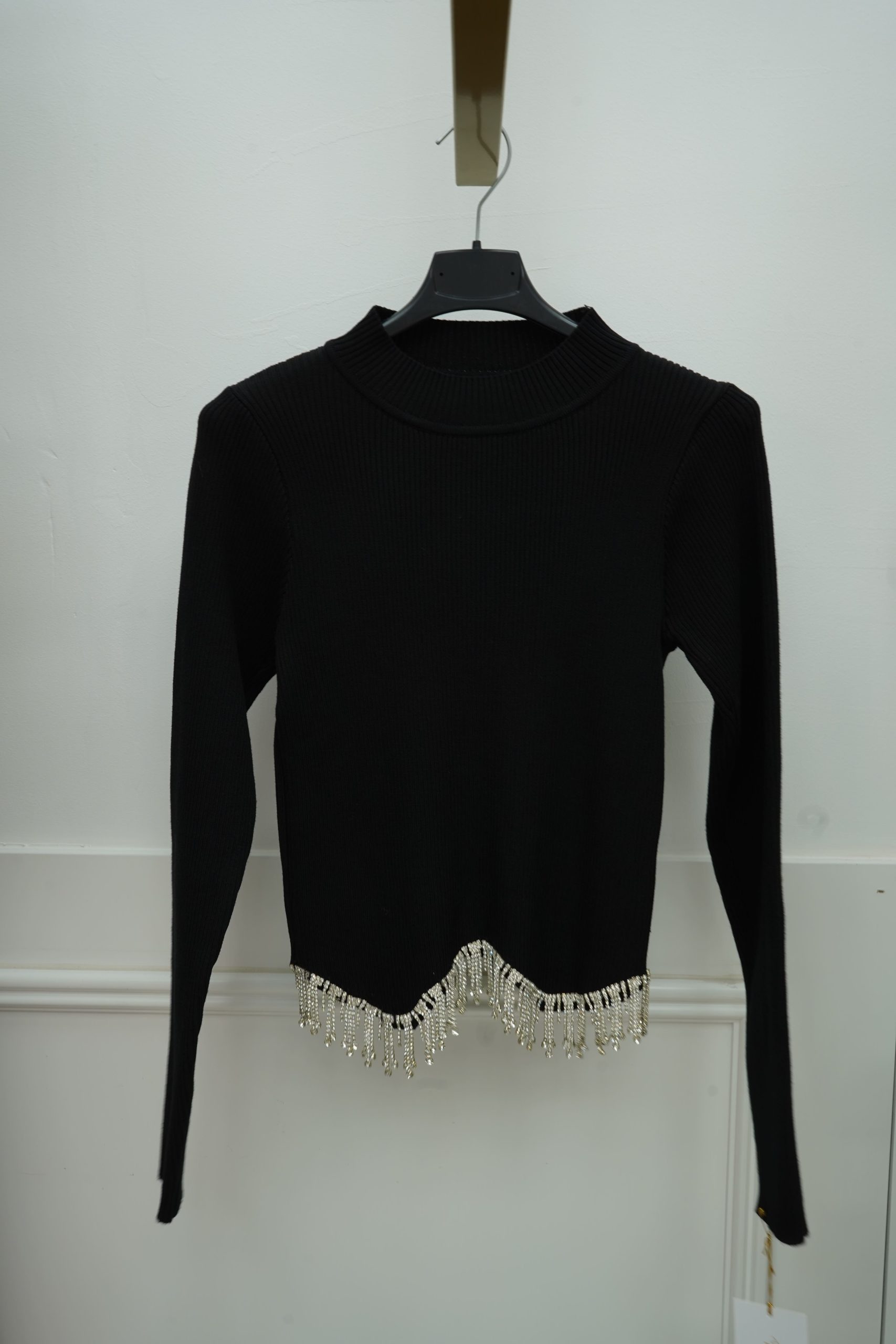 camisola com brilhos pendurados