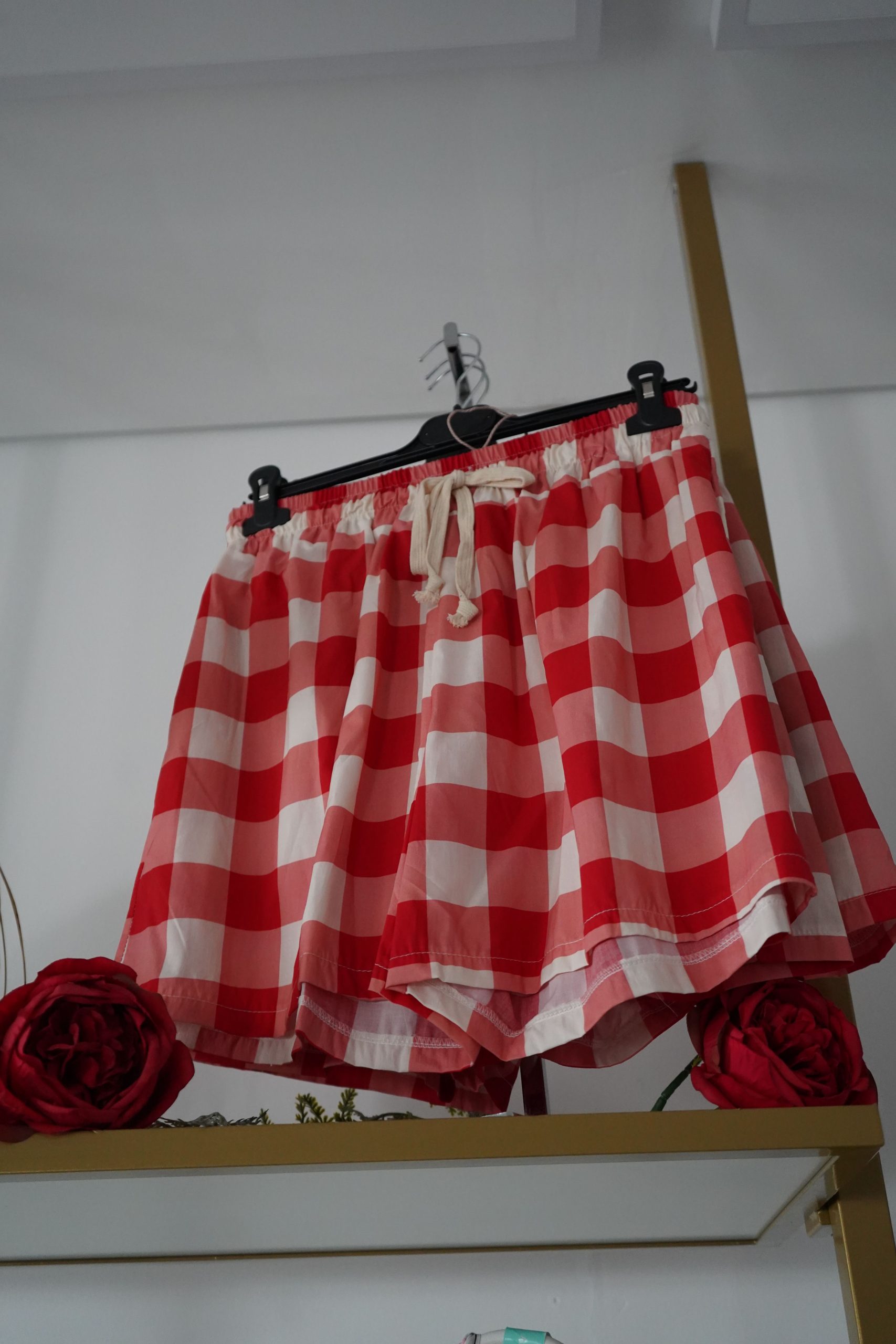 calções xadrez vermelho